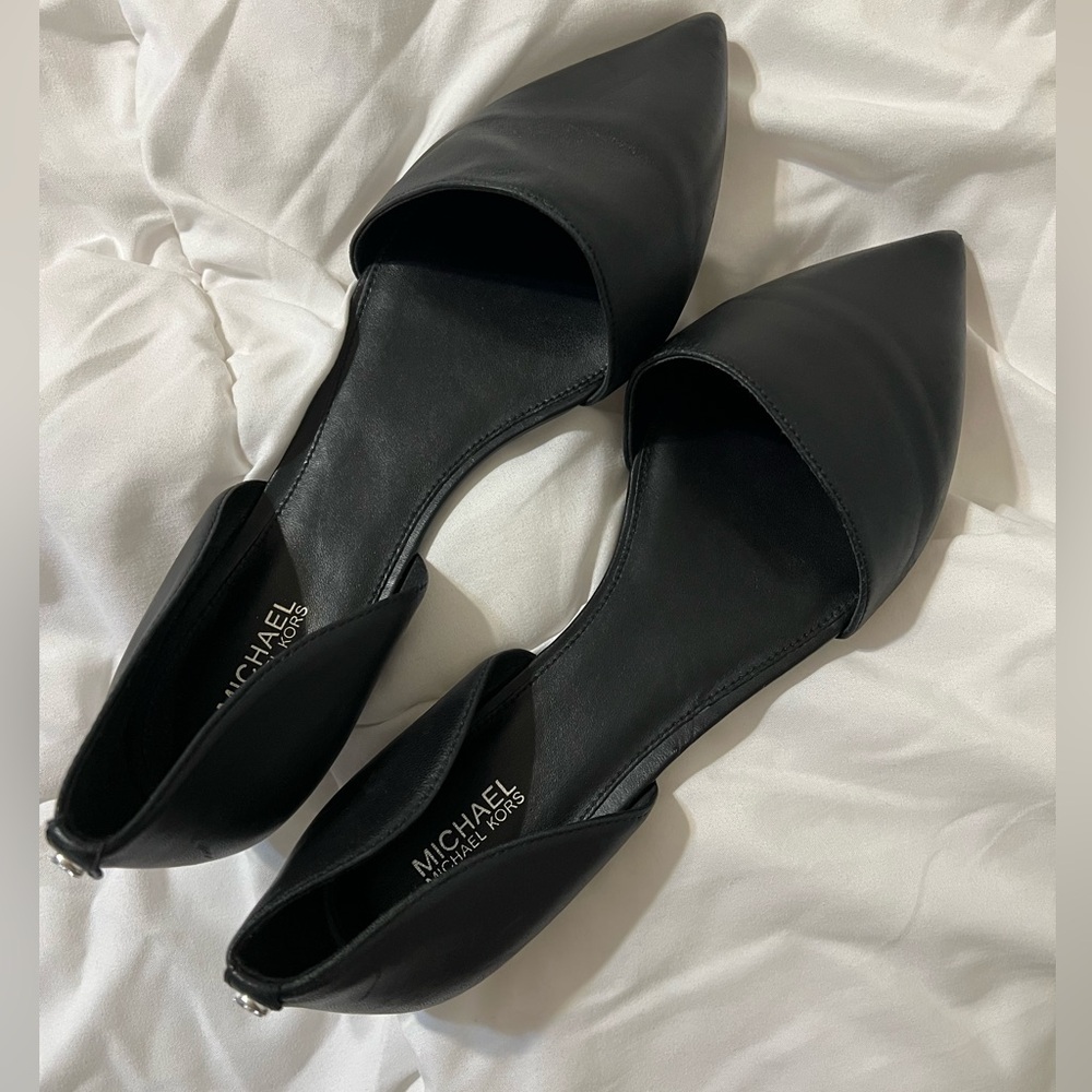 Michael Kors black size 9 women’s flat.